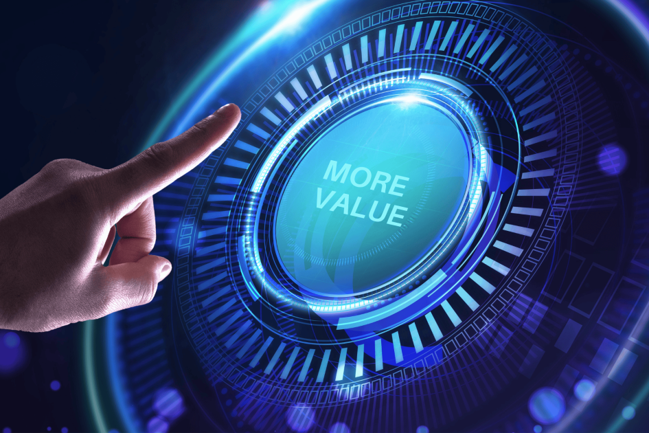 A digitally enhanced image of a human hand reaching toward a futuristic, glowing interface with a circular button labeled "MORE VALUE." The high-tech design, with blue neon lights and intricate digital patterns, symbolizes innovation, efficiency, and enhanced service delivery. In the context of a managed service provider (MSP), this visual represents the commitment to providing greater strategic IT value to SME clients—optimizing technology, improving reliability, and driving business growth through smarter IT solutions.